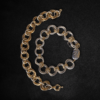 BiMetal Triple Orbital Bracelets on a black background