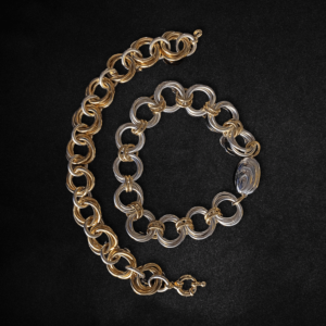 BiMetal Triple Orbital Bracelets on a black background